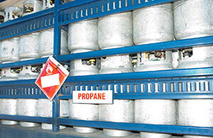 Rack of propane canisters